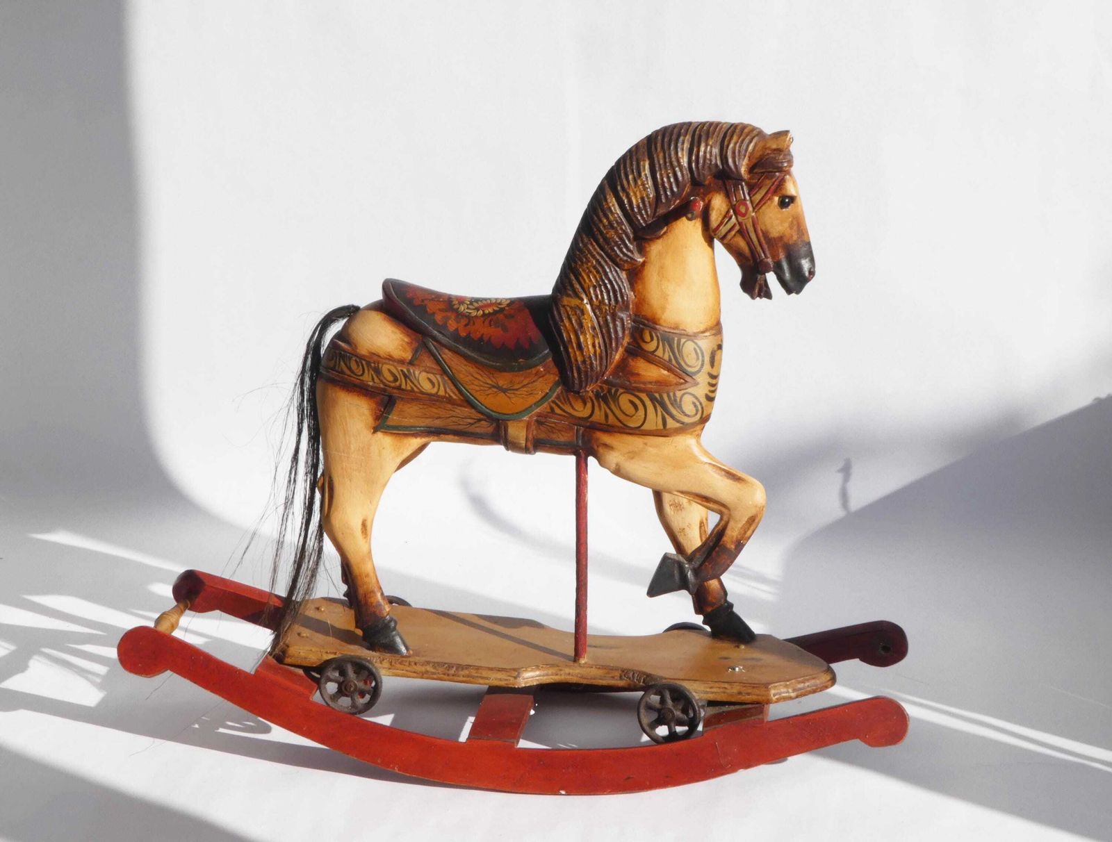 Wood Carved Rocking Horse With Glass Eyes, Carousel Horse With Floral Painted Details, Old Animal Toy On Wheels, Art Object photo furniture