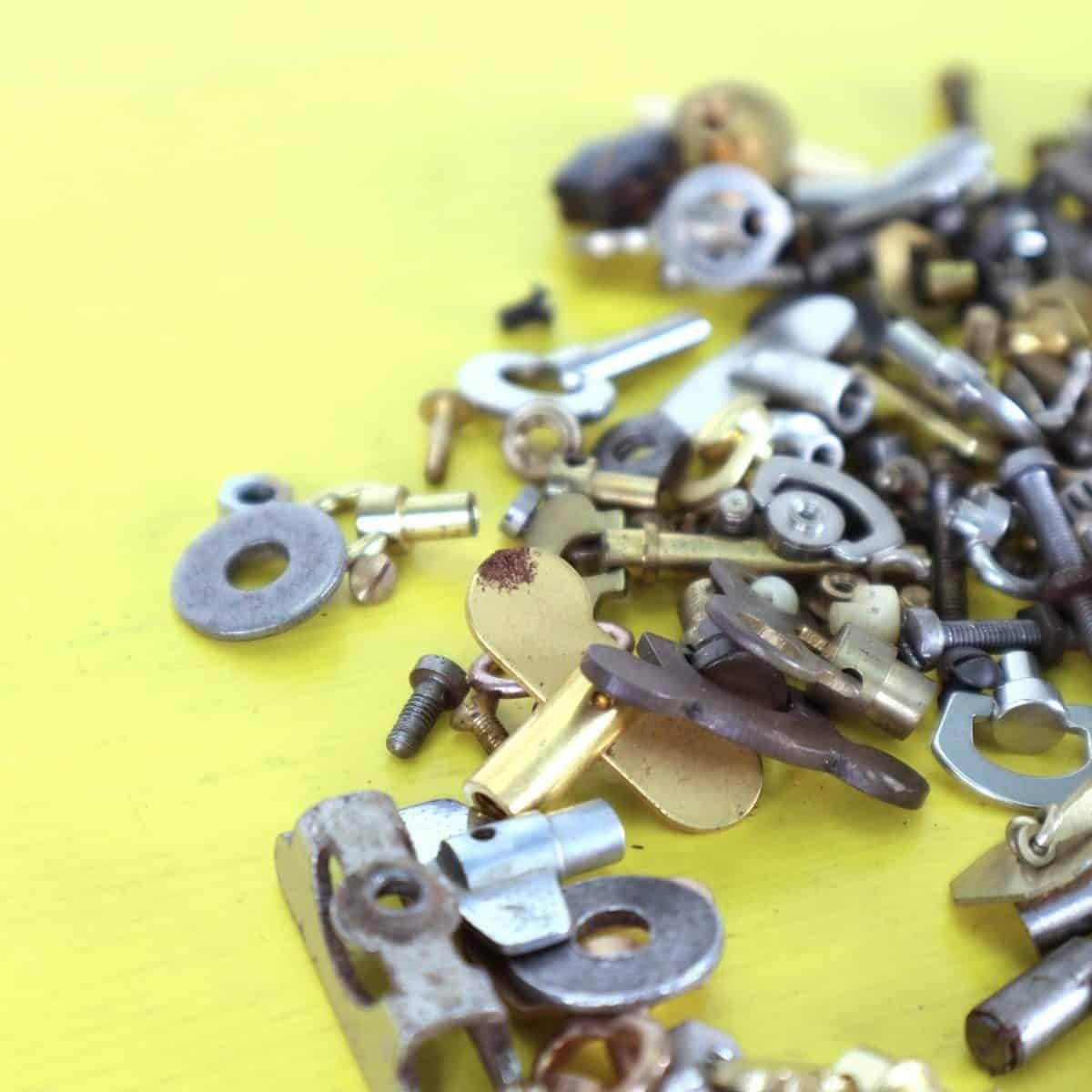 Lot Of Spare Parts For Alarm Clocks, Keys, Screws And More photo Home Decor
