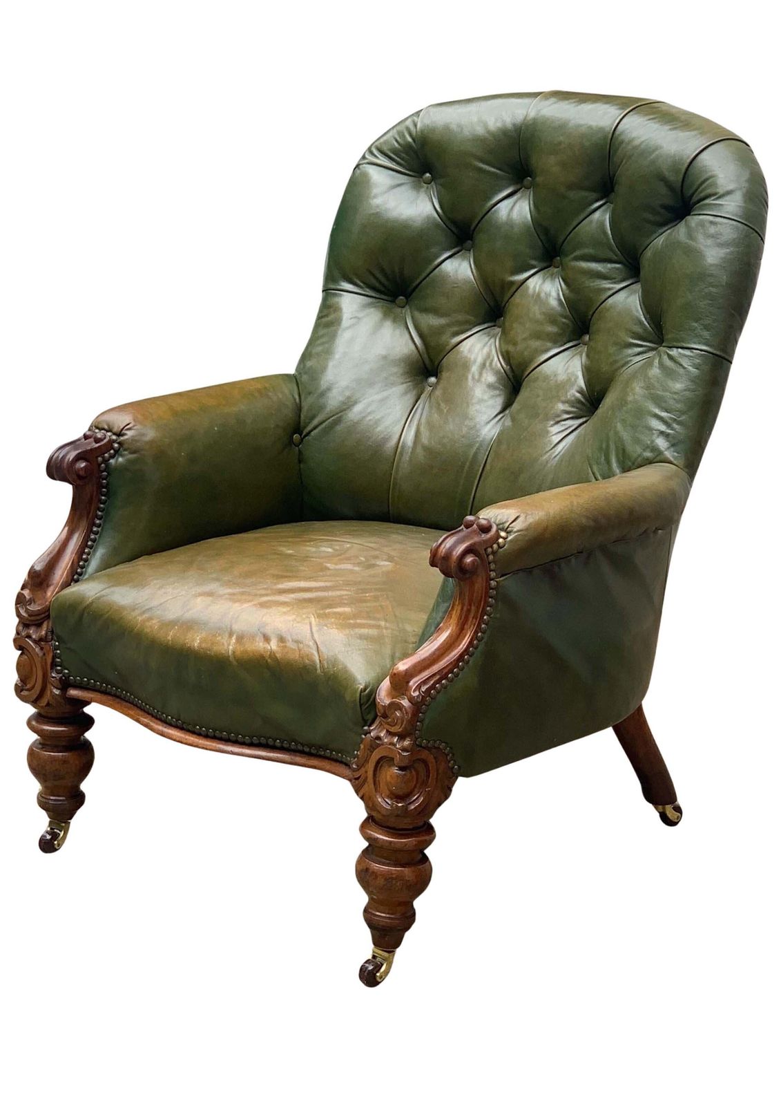 Victorian Polished Racing Green Leather Chesterfield Armchair With Brass Stud Detailing On Brown Porcelain Castors