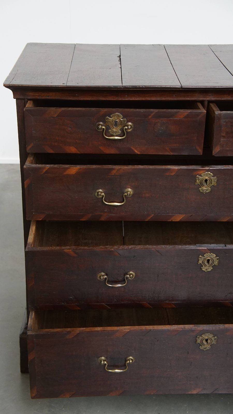 English Antique And Elegant Early Georgian Oak Chest Of Drawers With Unique Inlay Of Different Wood Types photo buy