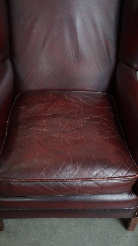 Set Of 2 Beautiful And Comfortable Burgundy Red Cowhide Wing Chairs In English Style With A Beautiful Patina photo vinterior