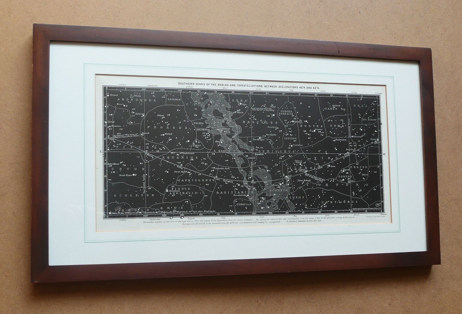 A Framed Late 19th Century Print Southern Signs Of The Zodiac And Constellations Between Declinations 45n. And 45s  By Edward Stanford photo furniture