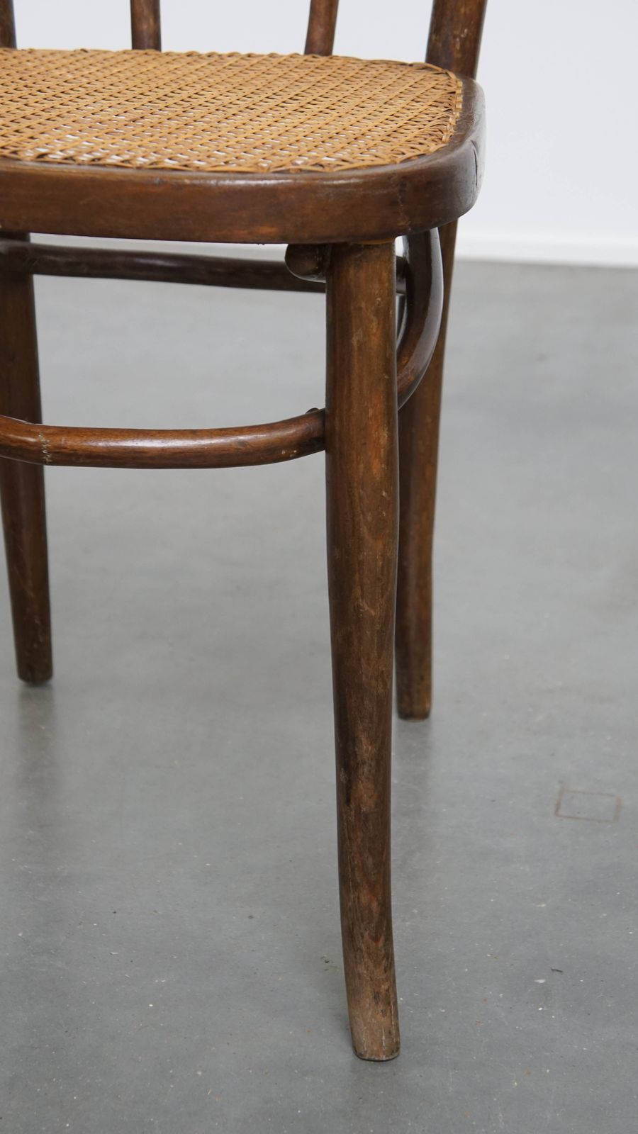 photo furniture Lovely Timeless Bistro Chair In The Style Of Thonet With A Woven Wicker Seat