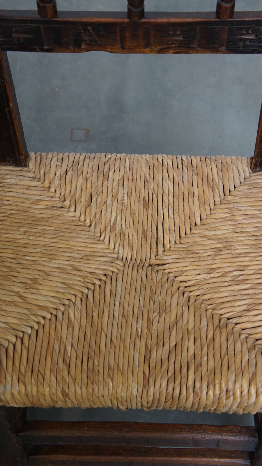 photo for sale Unique Set Of 4 Antique Spanish Farm Chairs With Woven Wicker Seats And Beautiful Wood Carvings