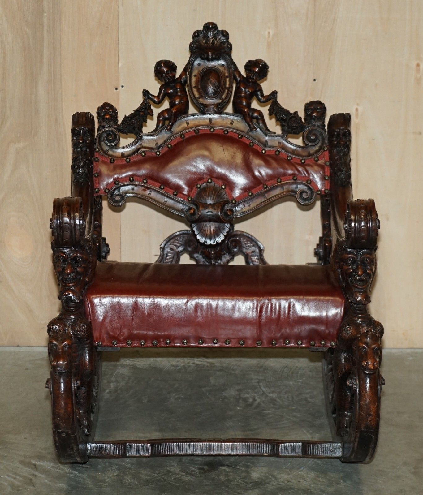 Antique Italian Circa 1850 Hand Carved Fruitwood Leather Rocking Armchair photo for sale
