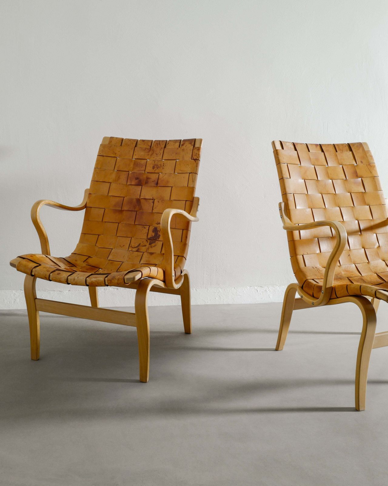 A Pair Of Swedish Mid Century Wooden "Eva" Armchairs In Birch & Patinated Leather By Bruno Mathsson, 1970s photo furniture