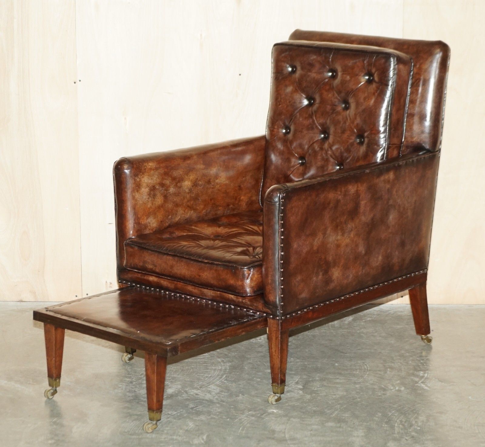photo for sale Pair Of Antique Regency  Brown Leather Chesterfield Armchairs Extending Stools