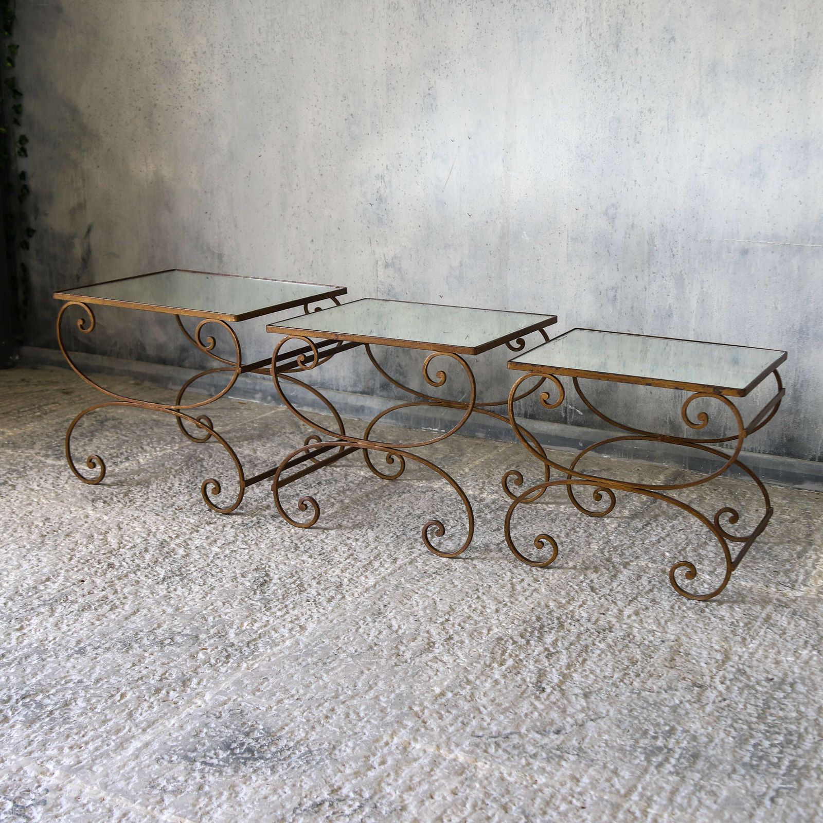 Mid Century Italian Nest Of 3 Gilt Metal Tables With Distressed Mirrored Tops photo for sale