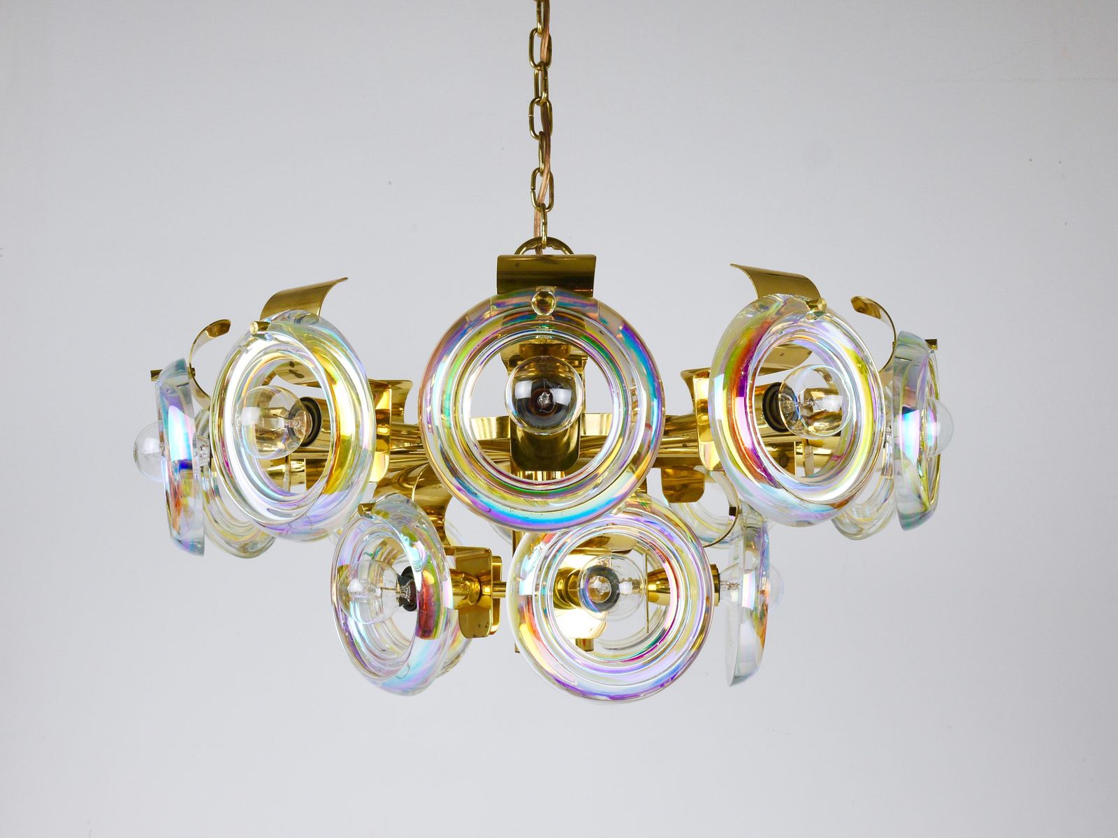 photo buy Oscar Torlasco Large Brass Chandelier, Optical Rainbow Glass Rings, Italy, 1970s