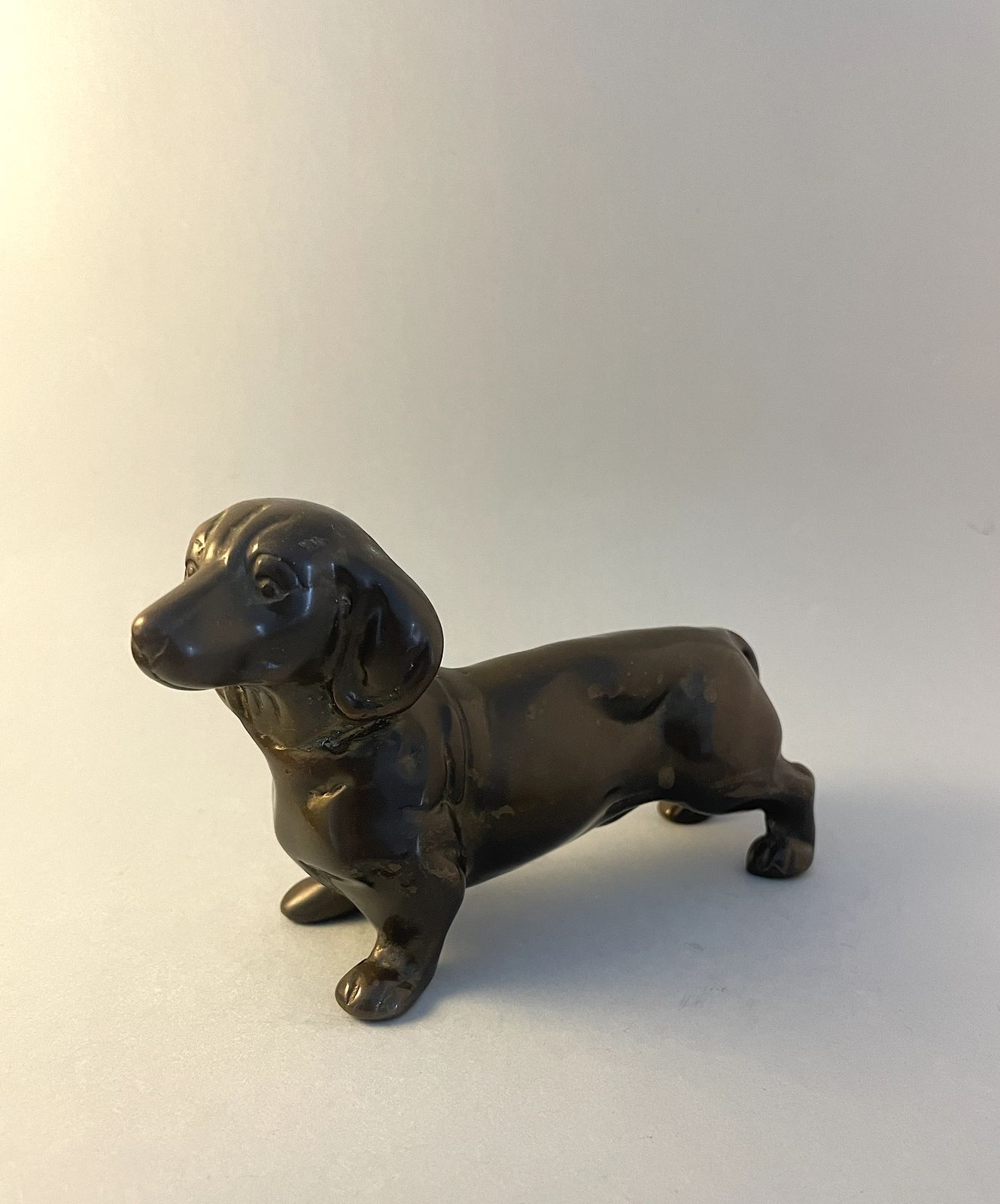 Bronze Sculpture Of A Dachschund, Vintage Heavy Metal Sausage Dog Ornament Statue photo furniture
