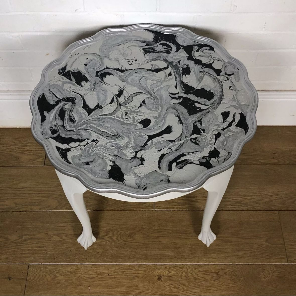 Light Grey And Silver Edged Pie Crust Paint Poured Table With Claw And Ball Feet photo vinterior