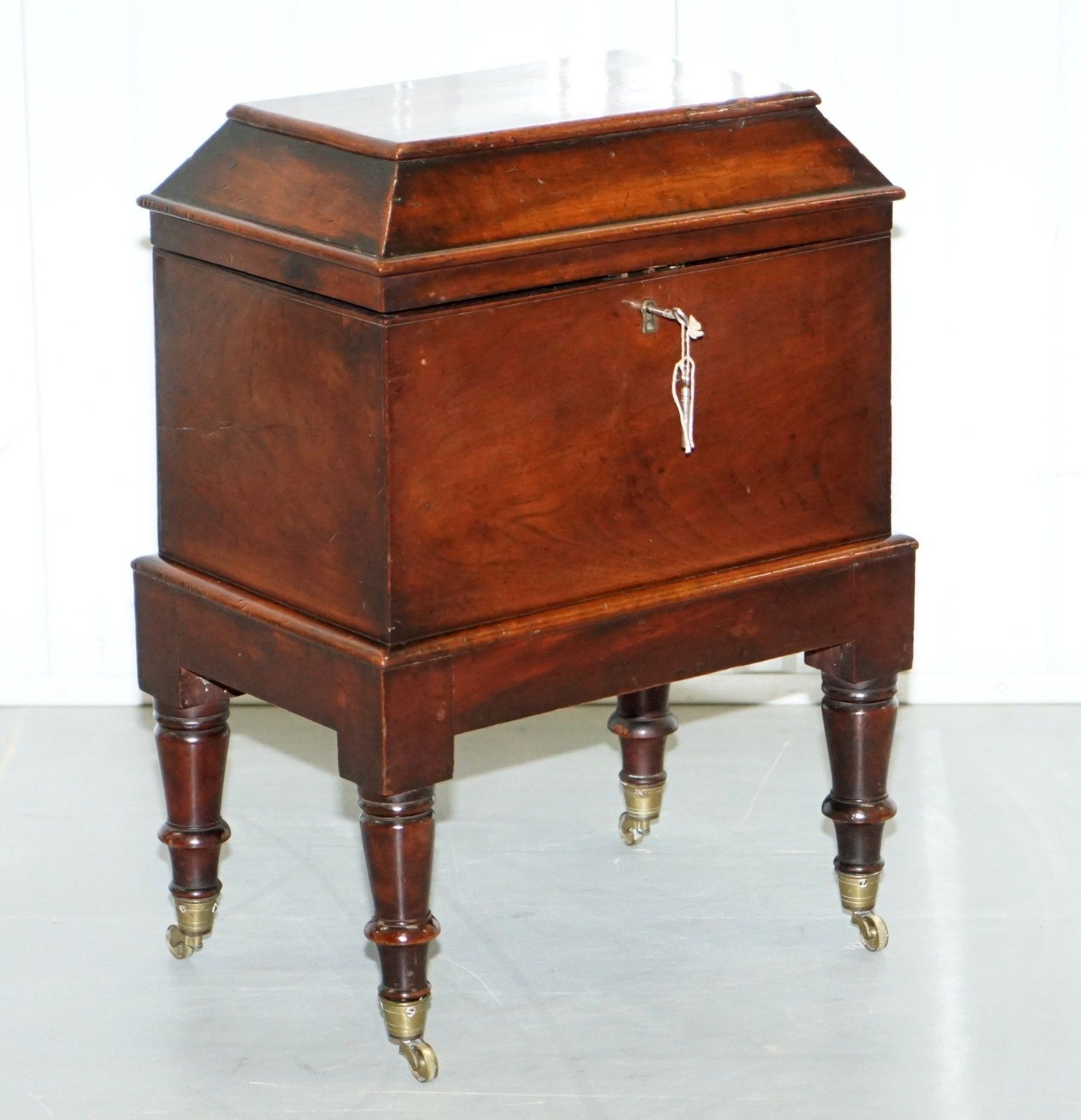 Very Rare Regency Mahogany Cellarette Of Sarcophagus Form Raised On Turned Legs photo furniture