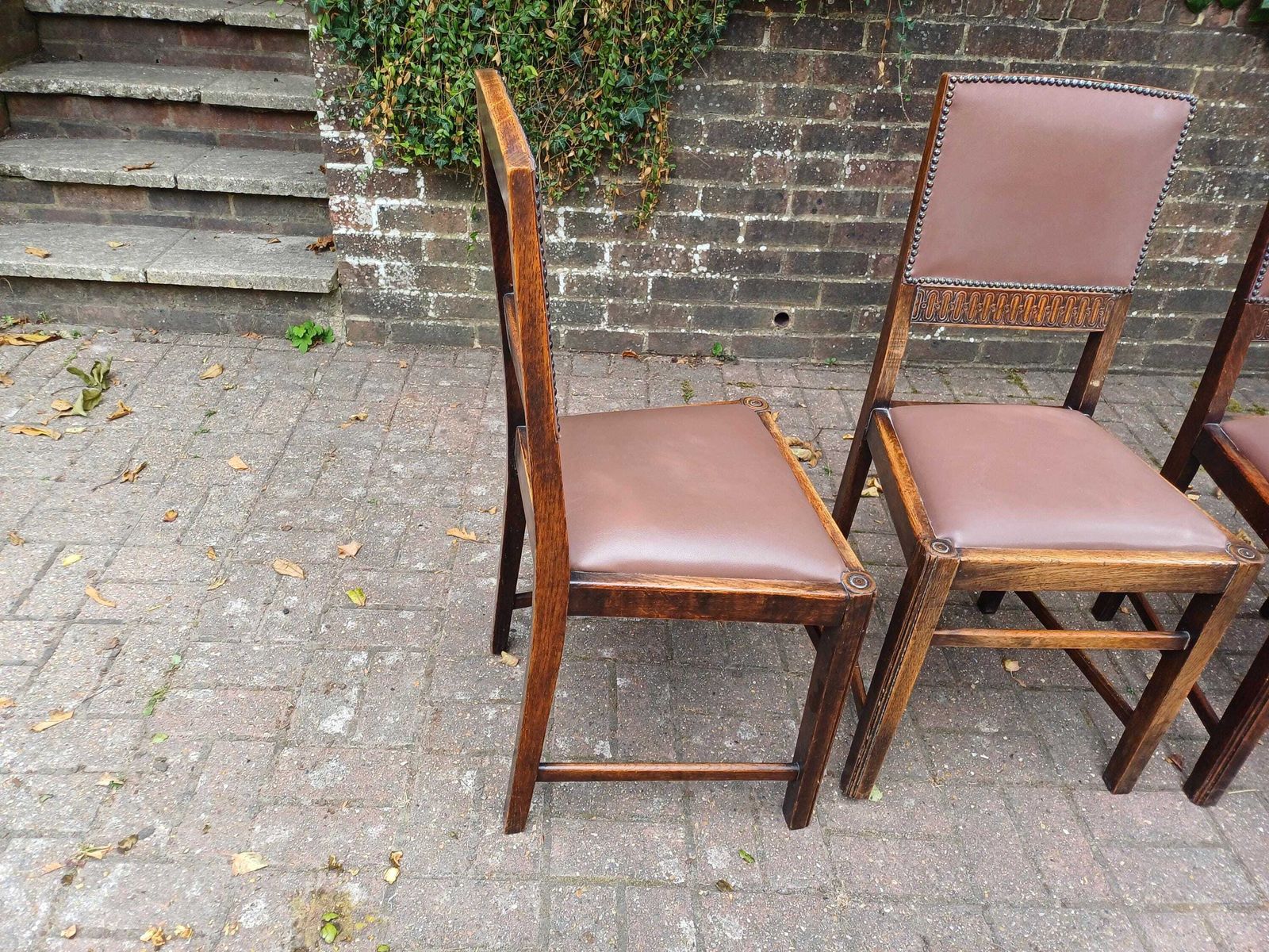 Set Of 4 Antique Oak Dining Chairs With Carved Backs & Studded Faux Leather Seats Early 20th Century Arts And Crafts Style photo vintage