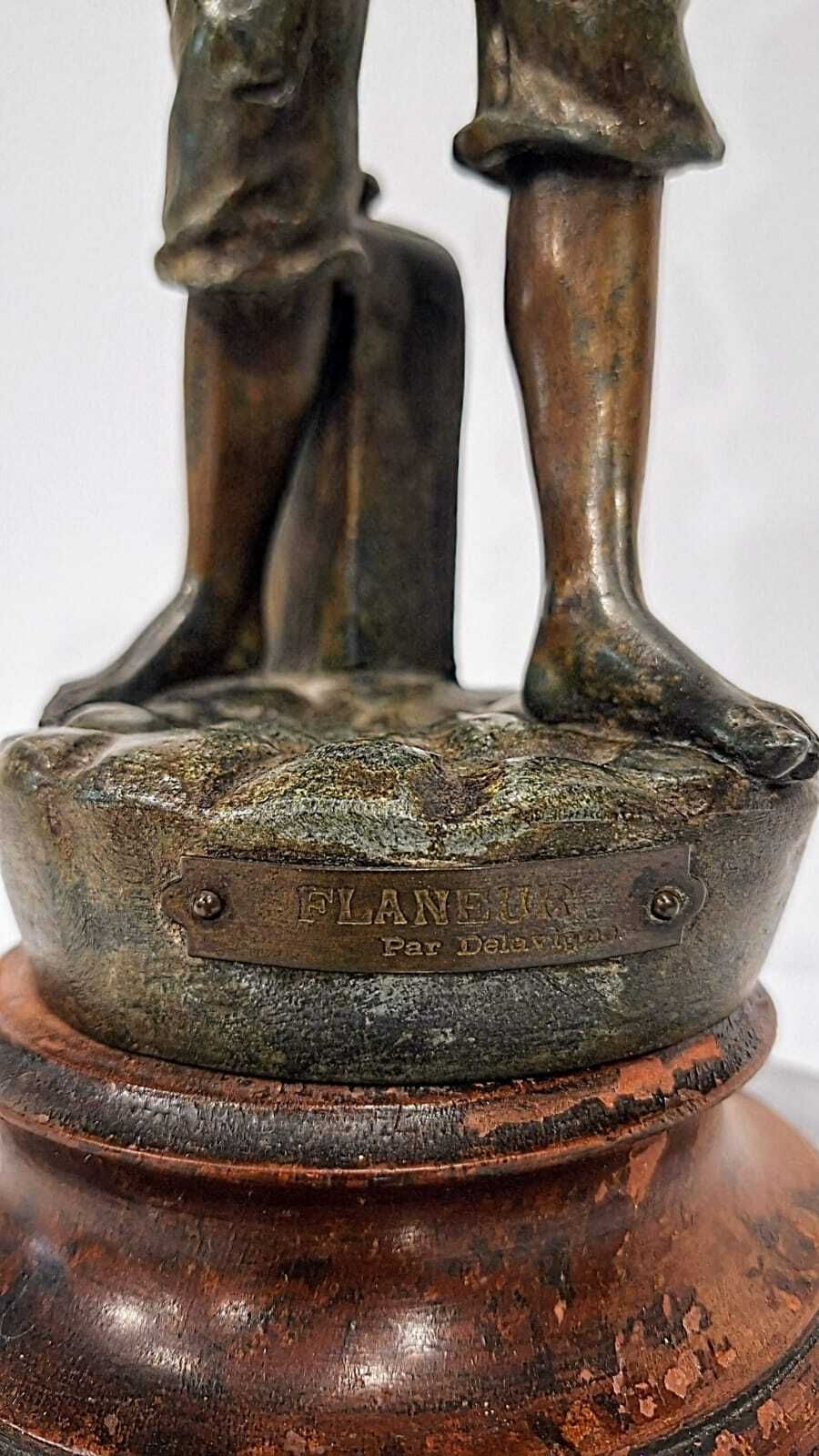 A French Spelter Statue Of A Boy Lighting A Pipe photo 855.0