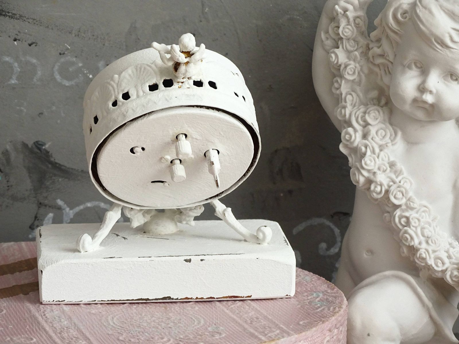 White Antique Cherub Table Clock: Tilted Rococo Metal Desk Decor photo vintage
