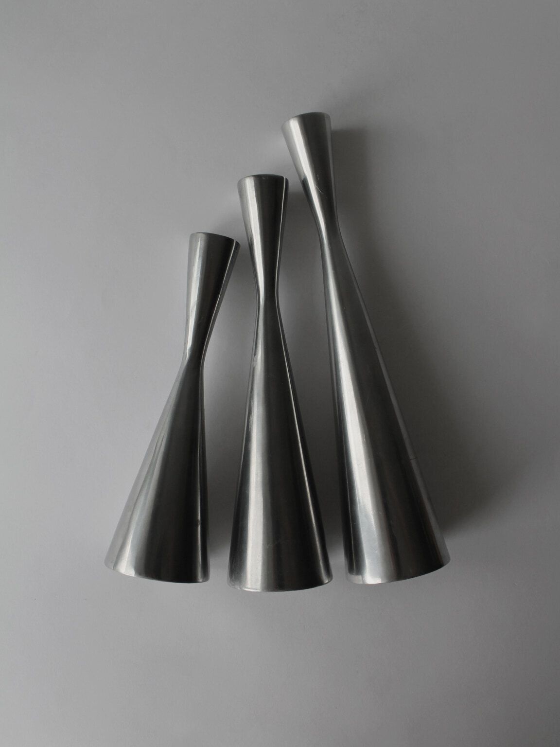 Polished Aluminum Trio Set Candle Holders photo furniture