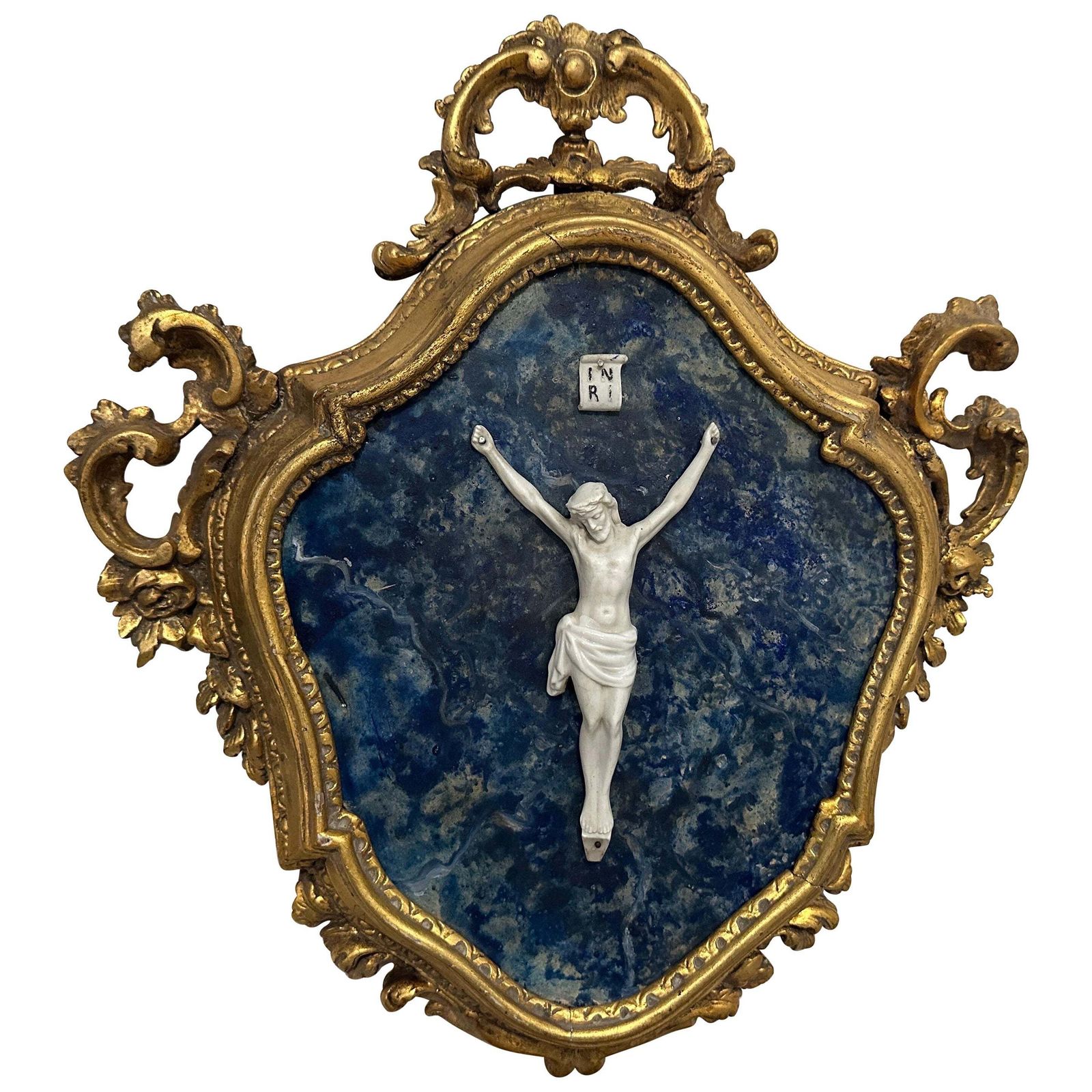 A Baroque Style Gilded Wood Box Frame Displaying A White Porcelain Christ