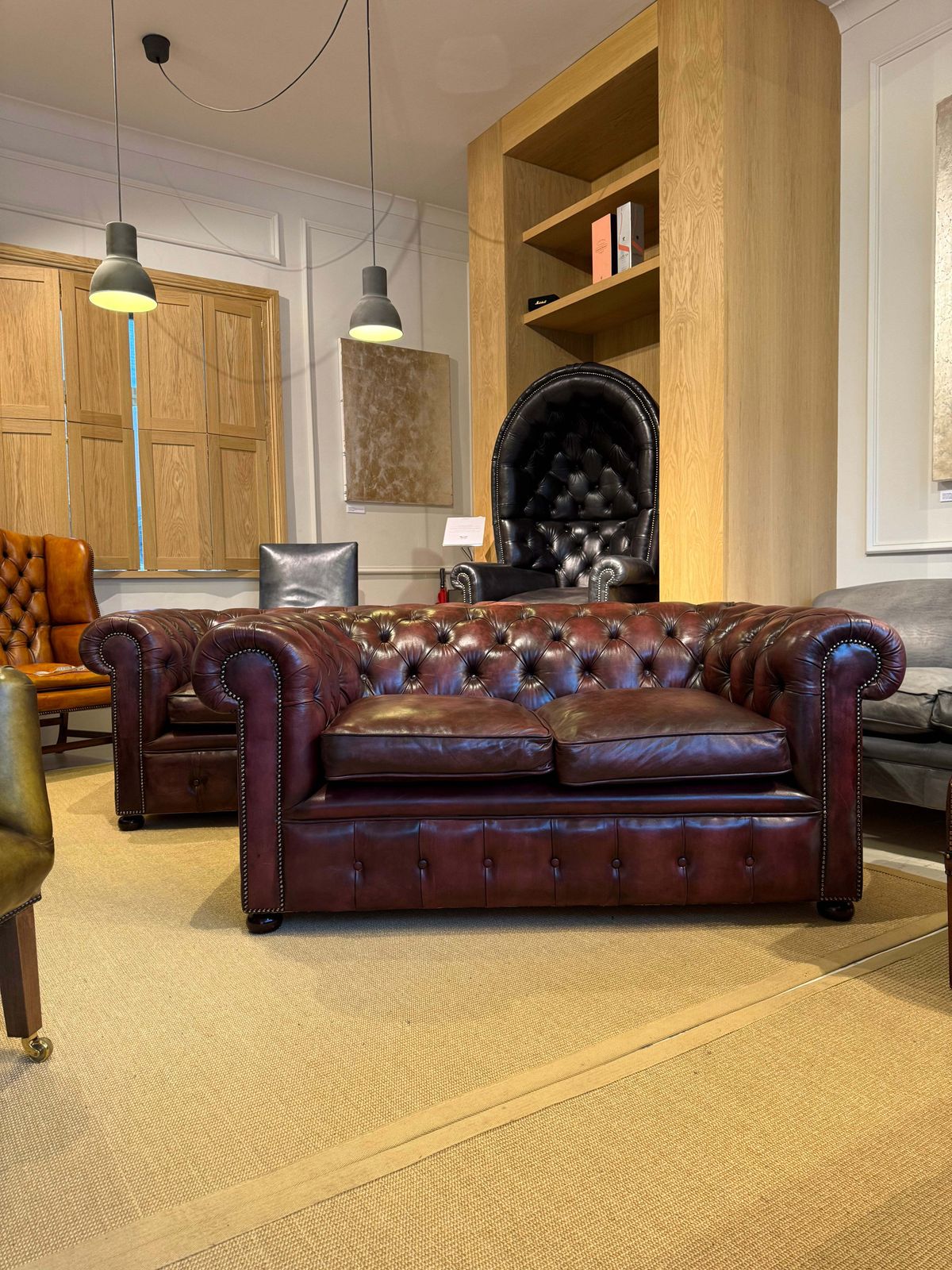 Fully Restored Matching Pair Of Mid Century Leather Chesterfield Sofas photo 9999.0