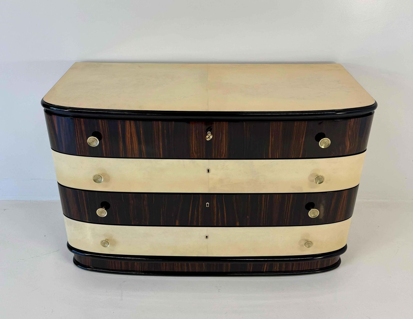 Italian Art Deco Chest Of Drawers In Macassar And Parchment With Brass Handle, 1940s photo for sale
