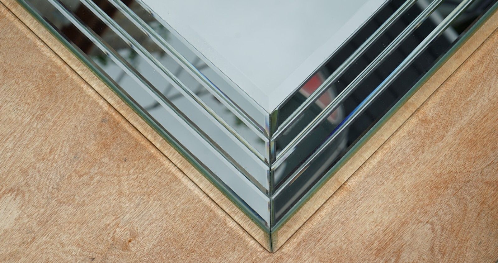 Lovely Large Triple Bevelled Edge Wall Hanging Mirror Designed To Pull Light photo for sale