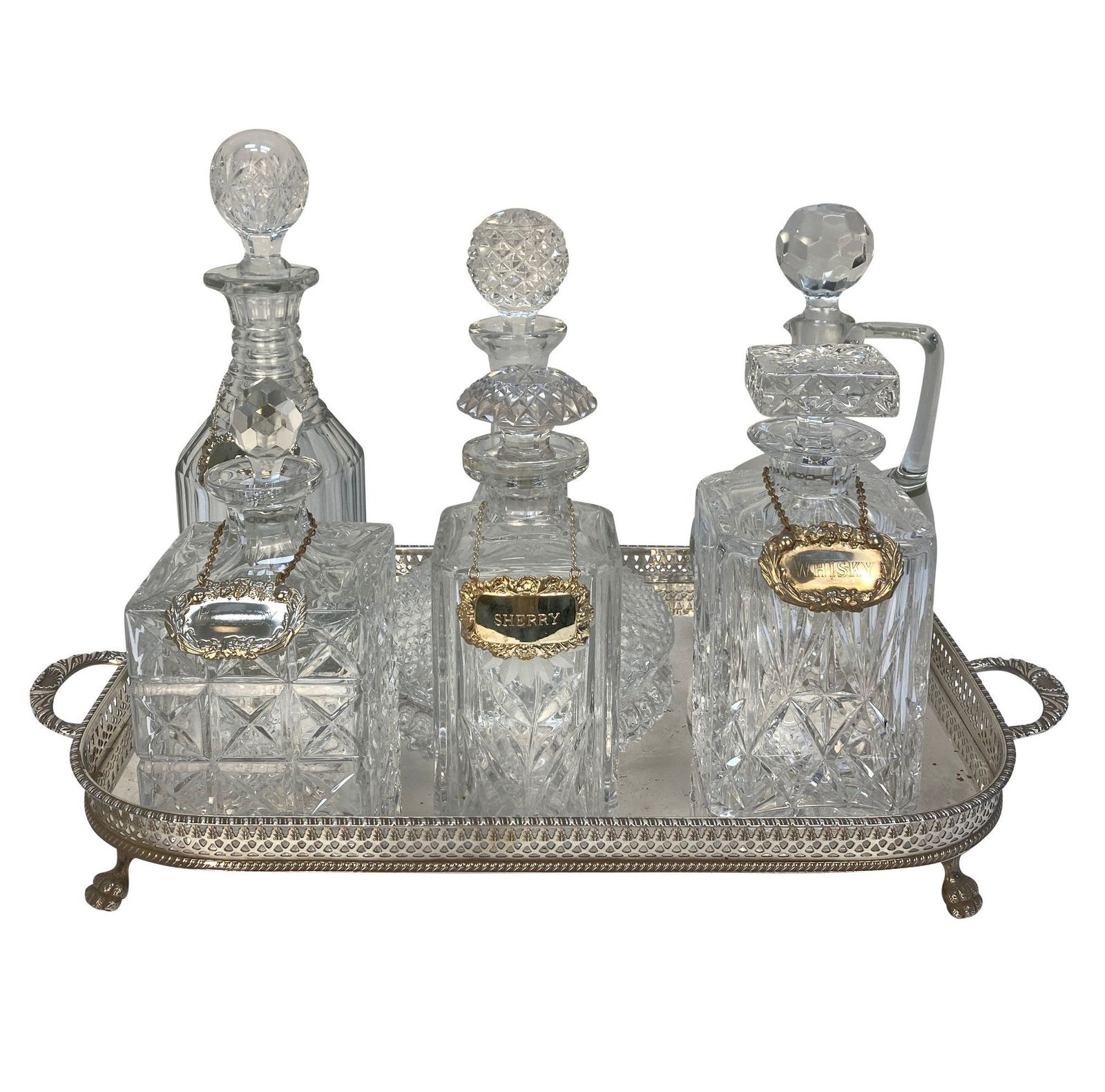 A Silver Drinks Tray With Six Glass Decanters