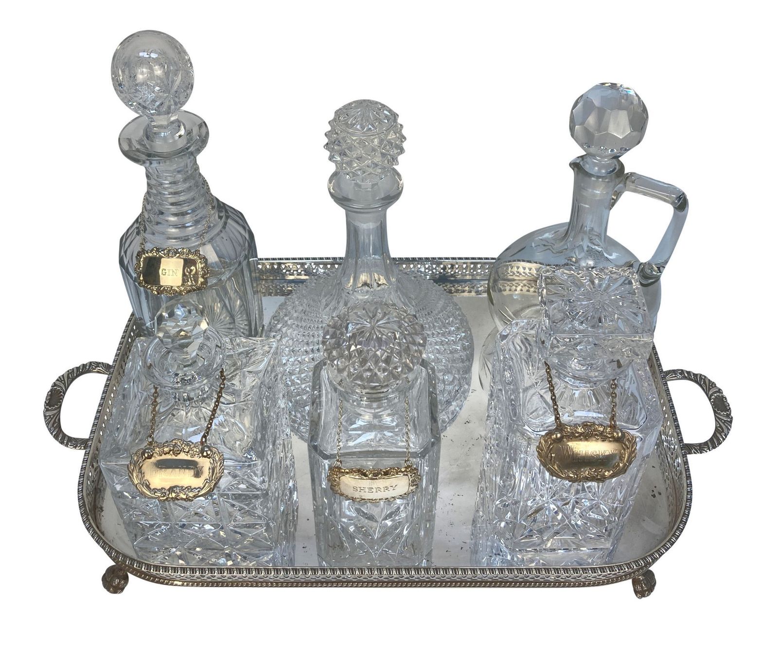 A Silver Drinks Tray With Six Glass Decanters photo furniture