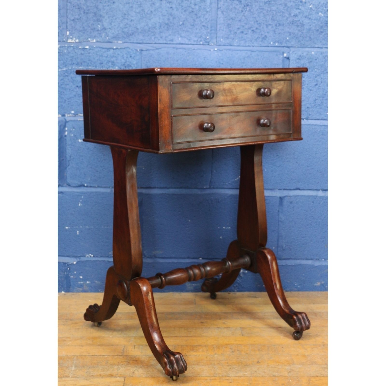 A Regency Mahogany Workbox Or Sewingbox Raised On Paw Feet And Lyre Supports
