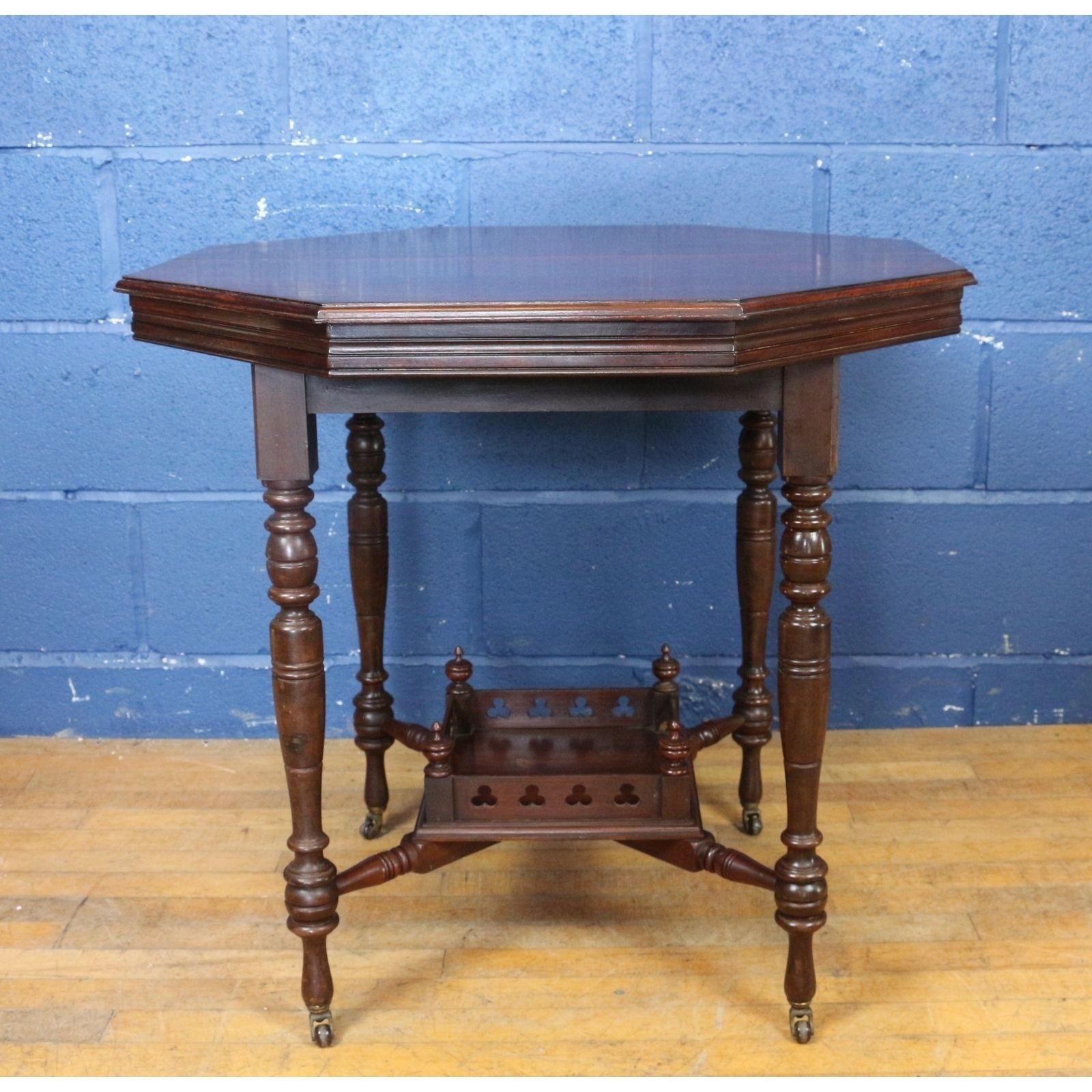A Victorian Walnut Octagonal Two Tier Occasional Table