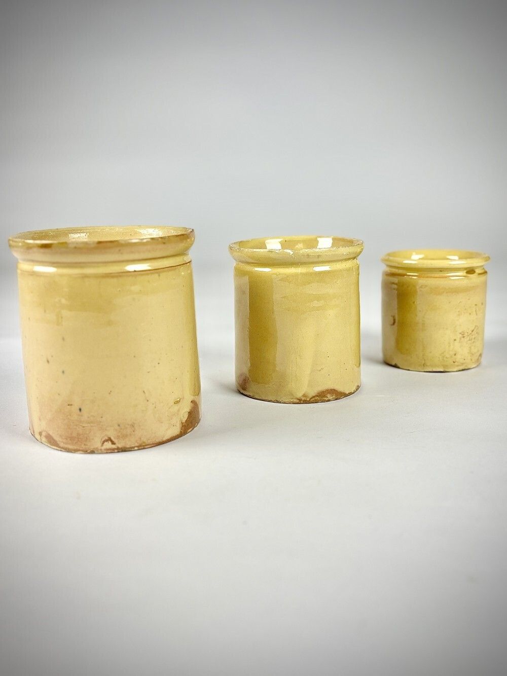 Collection Of Three Early 20th Century Yellow Slip Glazed Honey Pots photo for sale