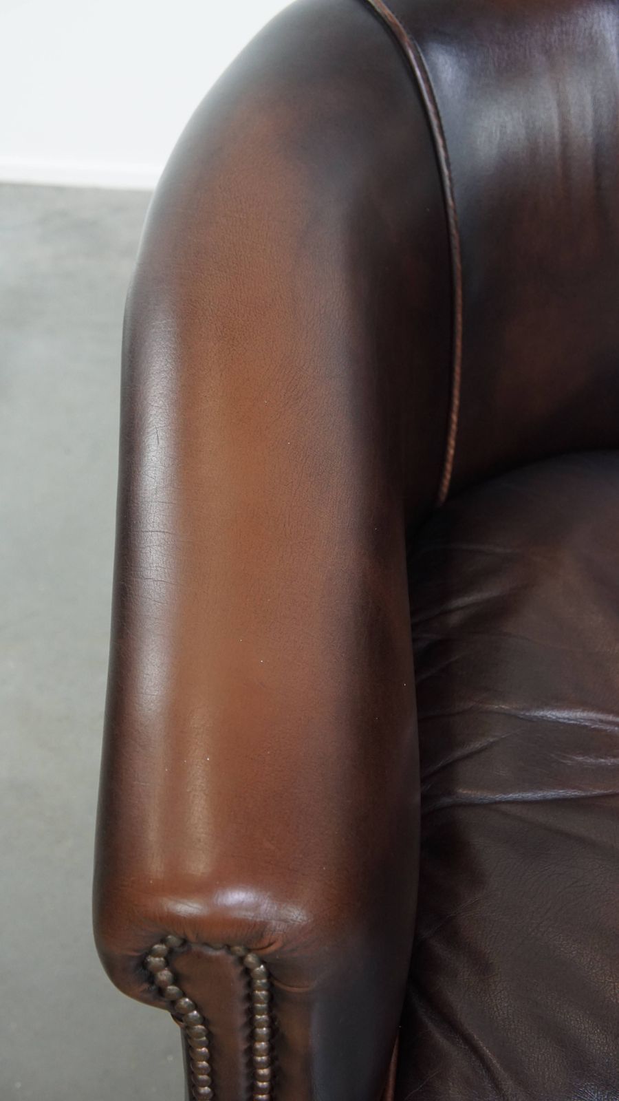 Elegant And Comfortable English Style Cowhide Club Armchair In A Beautiful Dark Color photo buy