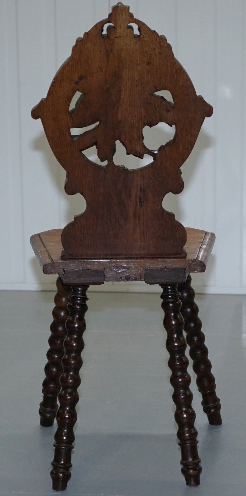 photo furniture Rare 19th Century Black Forest Carved Hall Chair Hand Carved Hawk Bobbin Turned