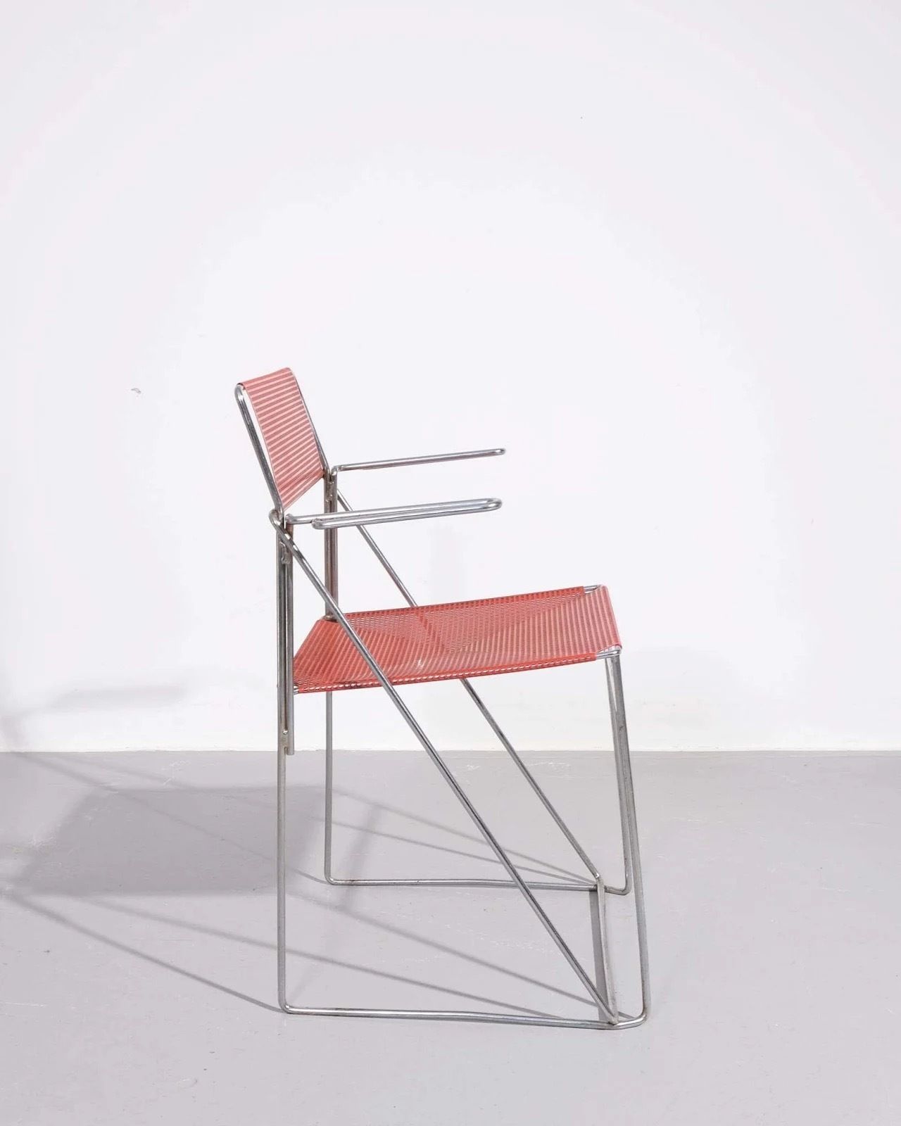 Niels Jørgen Haugesen For X Line Chair, Silver Metallic photo furniture