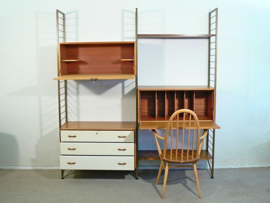 A Wall Leaning Gold Metal Ladderax System, C1960s photo vinterior
