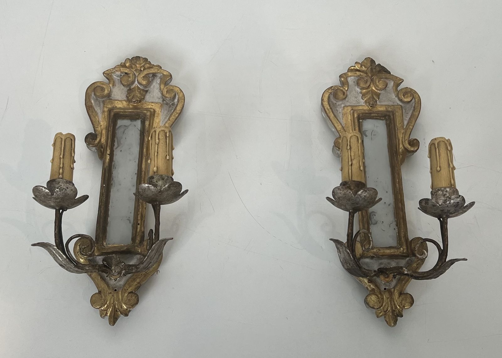 Pair Of Wall Lights In Carved Wood And Silver And Gold Patinated Metal With A Mirror In The Center