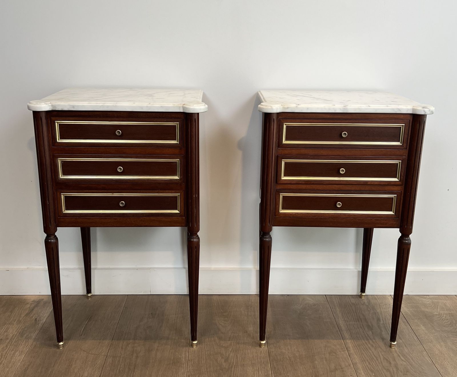Pair Of Mahogany And Brass End Tables Or Bedside Tables With Carrara Marble Tops In The Style Of Maison Jansen. Circa 1940 photo furniture
