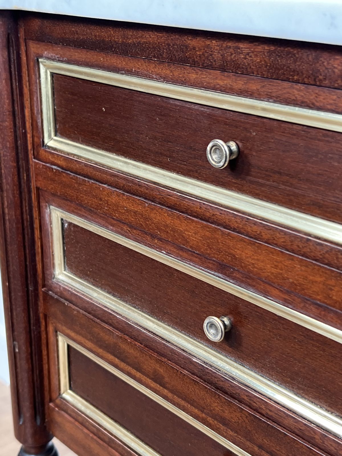 photo for sale Pair Of Mahogany And Brass End Tables Or Bedside Tables With Carrara Marble Tops In The Style Of Maison Jansen. Circa 1940