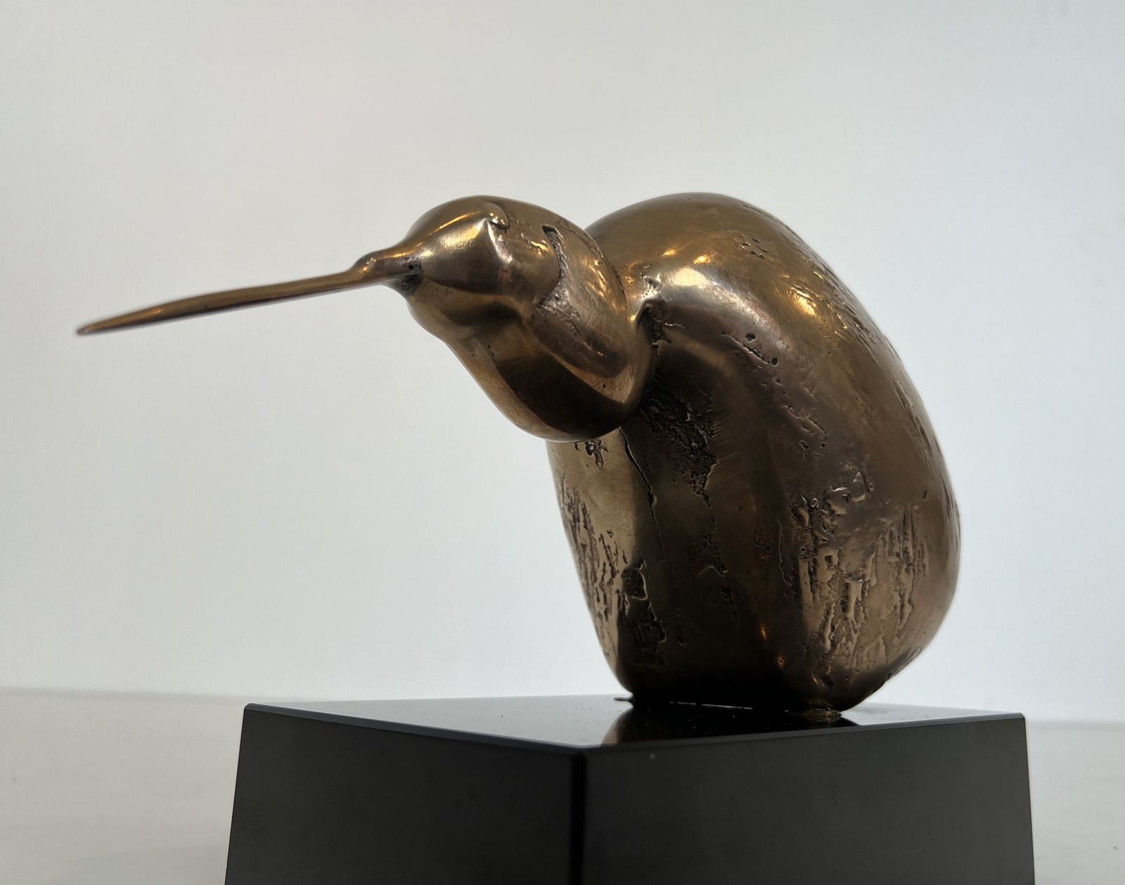 photo buy Bronze Sculpture Representing A Stylized Bird On A Black Marble Base, Signed And Numbered