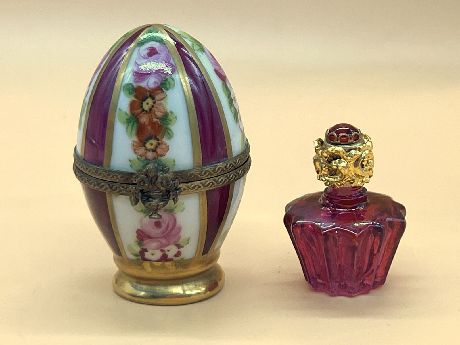 Limoges Porcelain France Egg Shaped Box With Internal Red Glass Perfume Bottle.