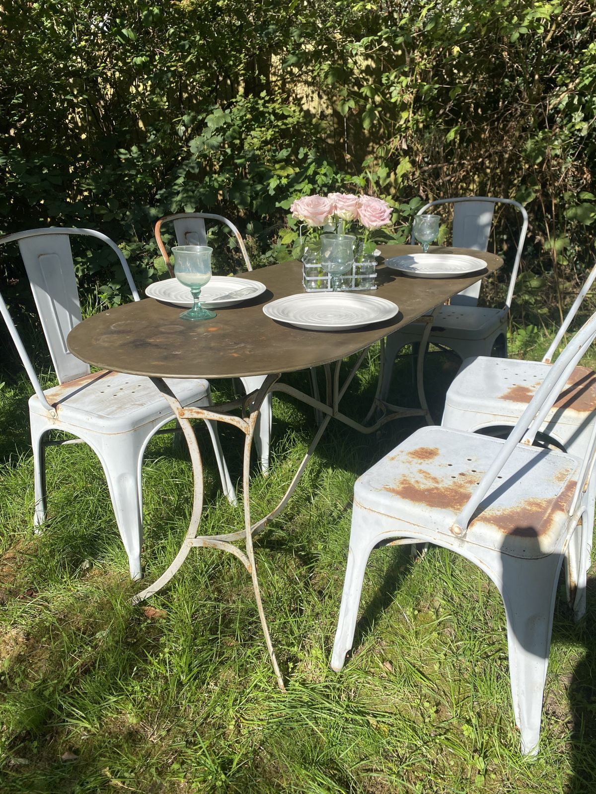 Vintage Look Garden Table With Tolix Chairs photo furniture