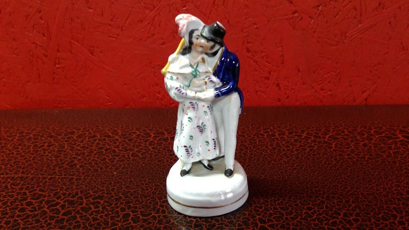 Small Staffordshire Porcelaneous Pottery Group Of A Dandy With His Moll.With Discounts