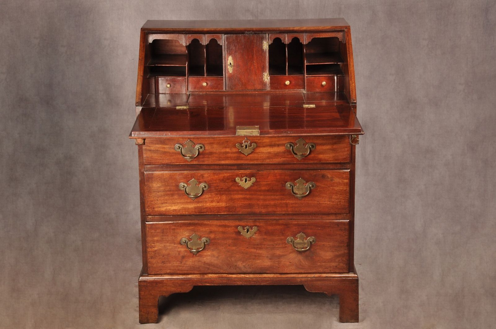 A Fine Small Early 18th Century Mahogany Bureau photo for sale