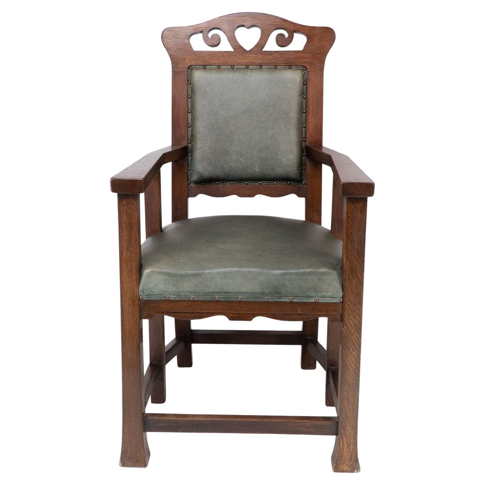 Heal And Son (Attributed). An Arts And Crafts Six Legged Oak Armchair