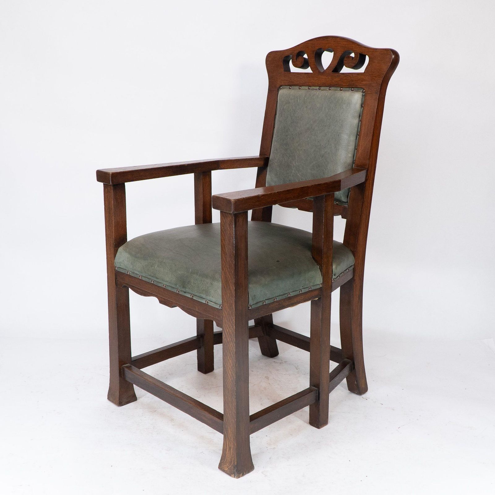 Heal And Son (Attributed). An Arts And Crafts Six Legged Oak Armchair photo for sale