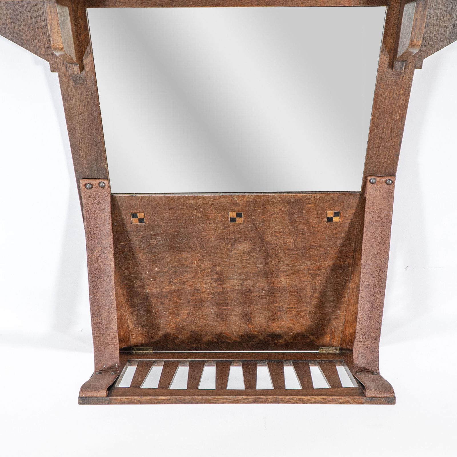 photo for sale Liberty And Co. An Arts & Crafts Oak Hanging Paper Rack With Central Mirror