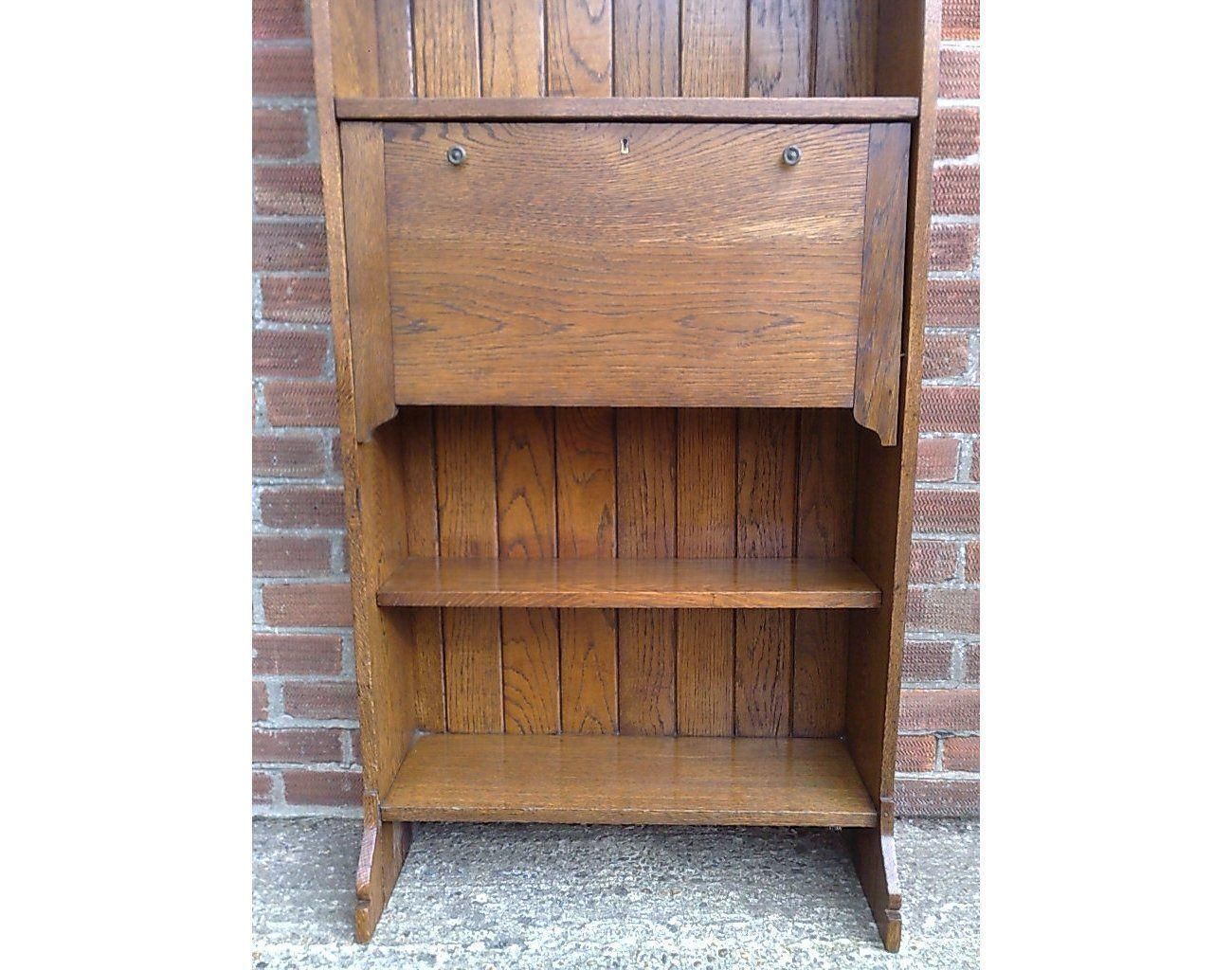 An Arts And Crafts Tall Oak Bureau Bookcase With Leaded Glass Doors photo 1023.0