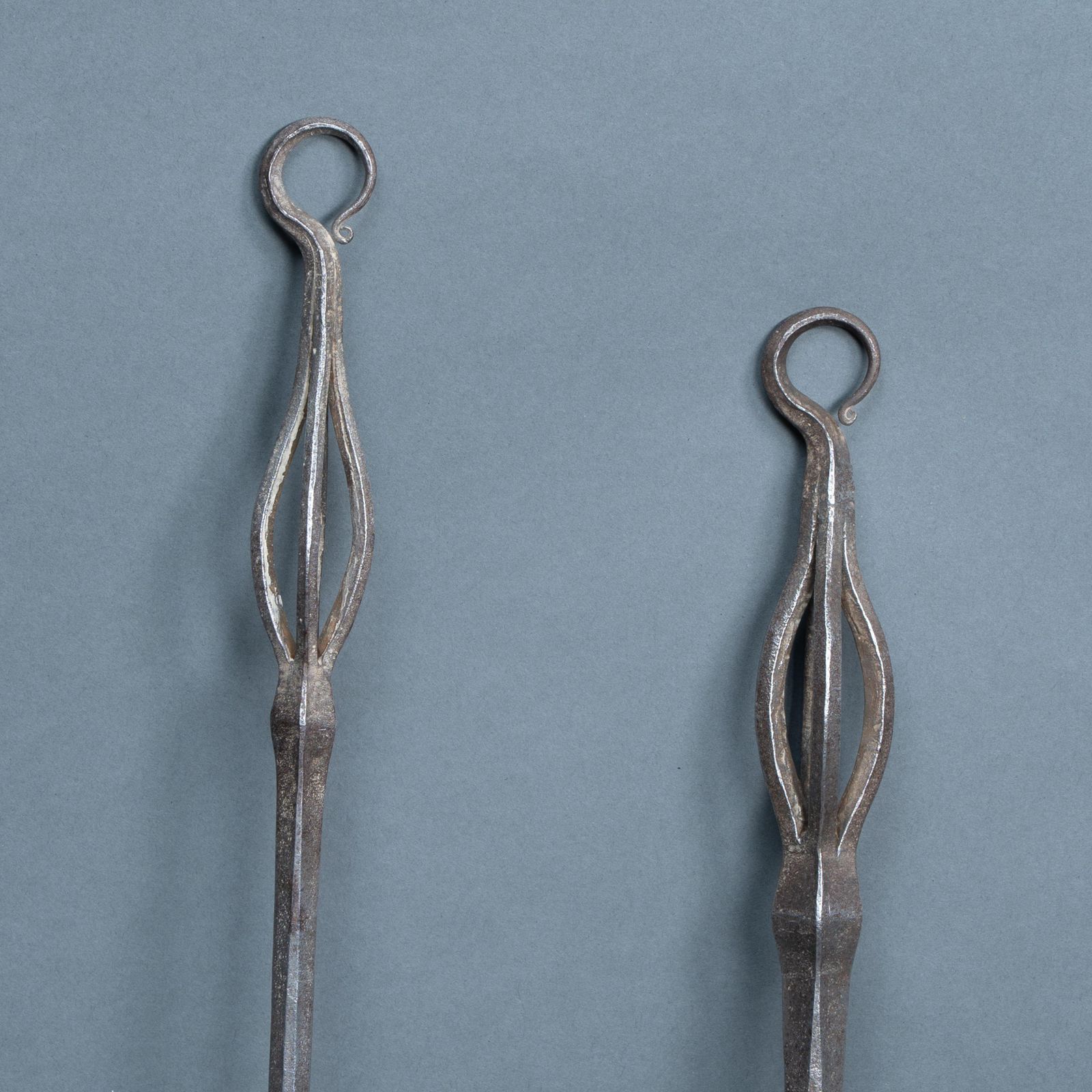 A Pair Of Arts And Crafts Steel Fire Utensils photo for sale