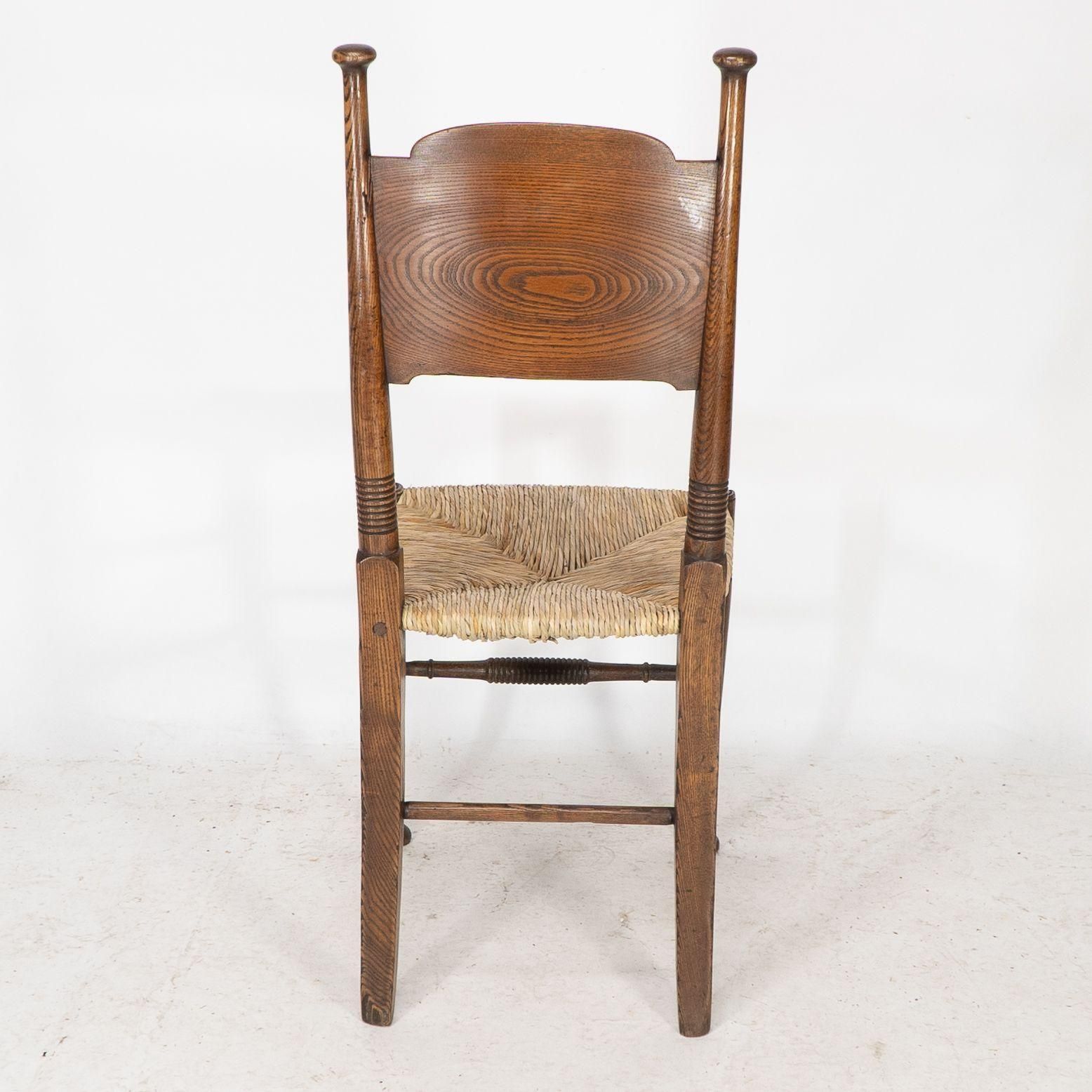 photo buy William Birch For Liberty & Co. A Pair Of Arts & Crafts Rush Seat Oak Chairs