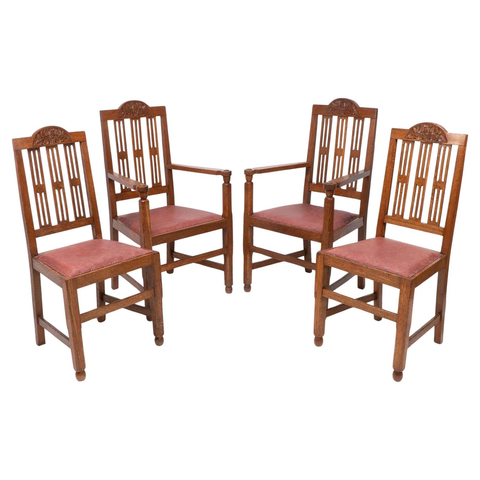 A Set Of Four Arts And Crafts Dining Chairs With Nicely Carved Floral Decoration