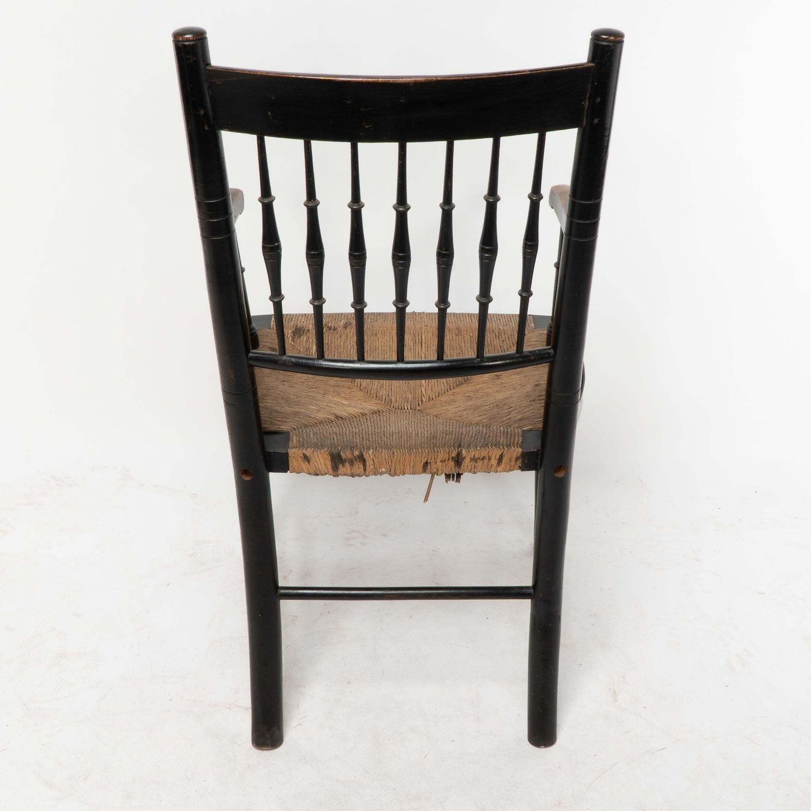photo buy Liberty & Co, Attributed. An Aesthetic Movement Rush Seat Armchair