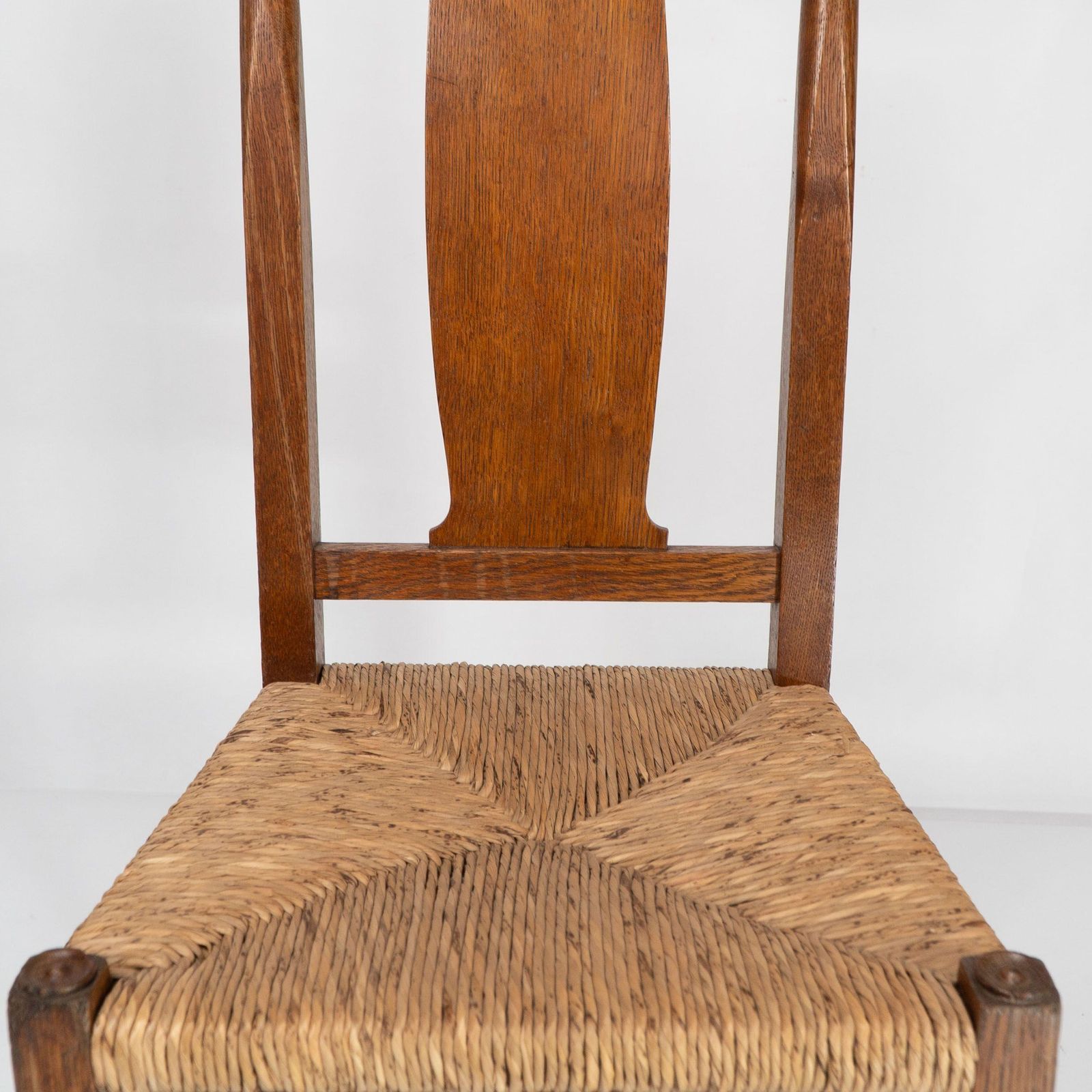 3264.0 Ambrose Heals For Heals Of London. A Pair Of Arts And Crafts Rush Seated Chairs photo